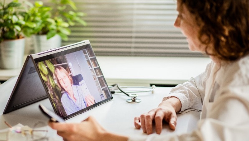 Telehealth Patient Consults With Doctor Remotely
